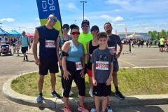 Groupe de participants près d’un panneau du parcours